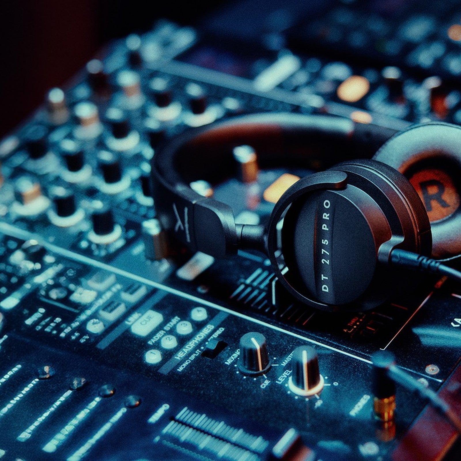 beyerdynamic DT 275 PRO on-ear monitoring headphones on a DJ mixer