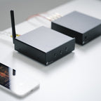 Pro-Ject Stream Box E music streamer connected to audio equipment in a modern home setting