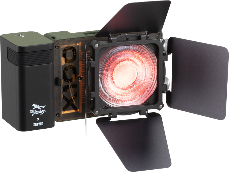 Zhiyun Molus X100 RGB light displaying vibrant multicolor lighting effects on a professional lighting setup.