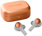Wireless in-ear headphones by Bang & Olufsen Beoplay Eleven with sleek design and compact charging case.