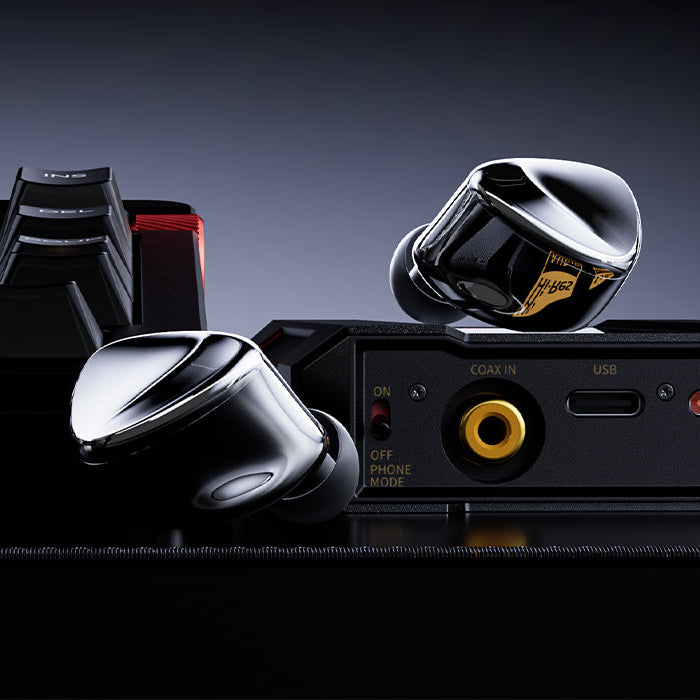 FiiO FX17 in-ear headphones with black ear tips and sleek design, showcasing the compact and portable audio accessory.