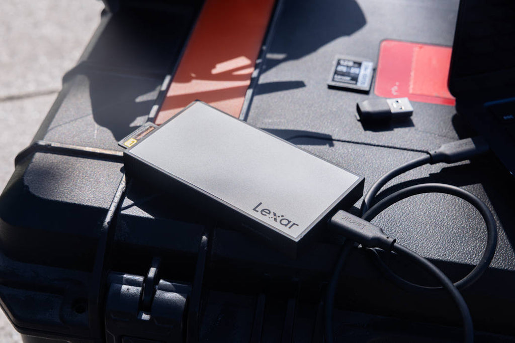Lexar Workflow SD and microSD UHS-II card reader connected to a computer for fast data transfer and storage.