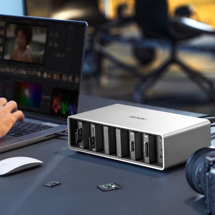 Lexar Workflow Go docking station with Thunderbolt 4 uplink and 6-module bay for professional data transfer and connectivity.