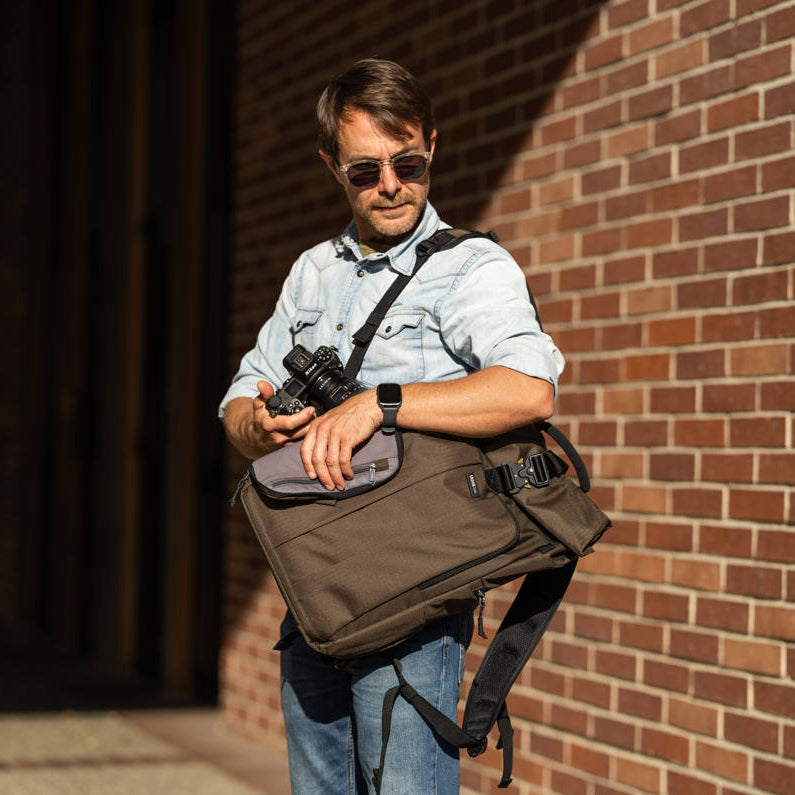 Think Tank FocusPoint RollTop video equipment bag with adjustable strap and roll-top closure, designed for secure camera gear storage.