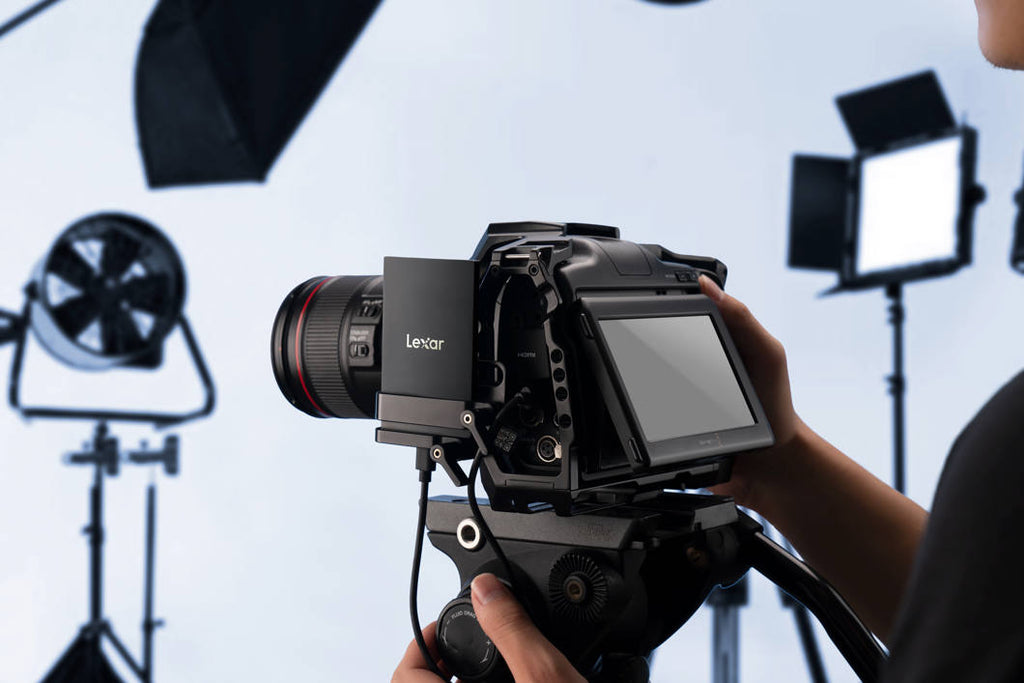 Lexar SL500 Portable SSD external drive with sleek black design and USB-C connection, highlighting compact and portable storage.