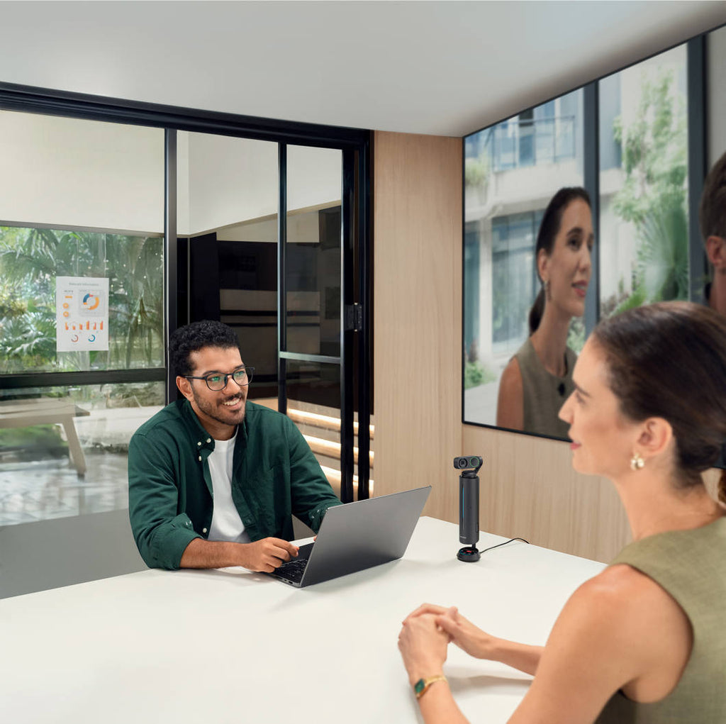 Insta360 Wave video conferencing camera showing sleek design and lens setup for high-quality virtual meetings.