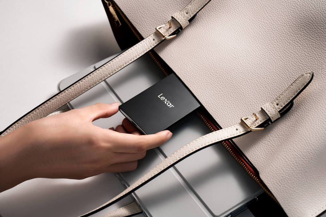 Lexar SL500 Portable SSD external drive with sleek black design and USB-C port, used for fast data storage and transfer.