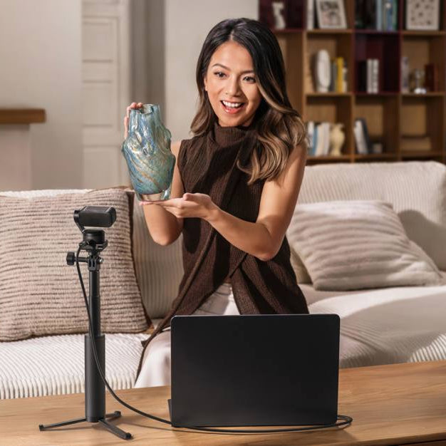 Insta360 Link 2 Pro video conferencing camera with adjustable lens and sleek design for high-quality virtual meetings.
