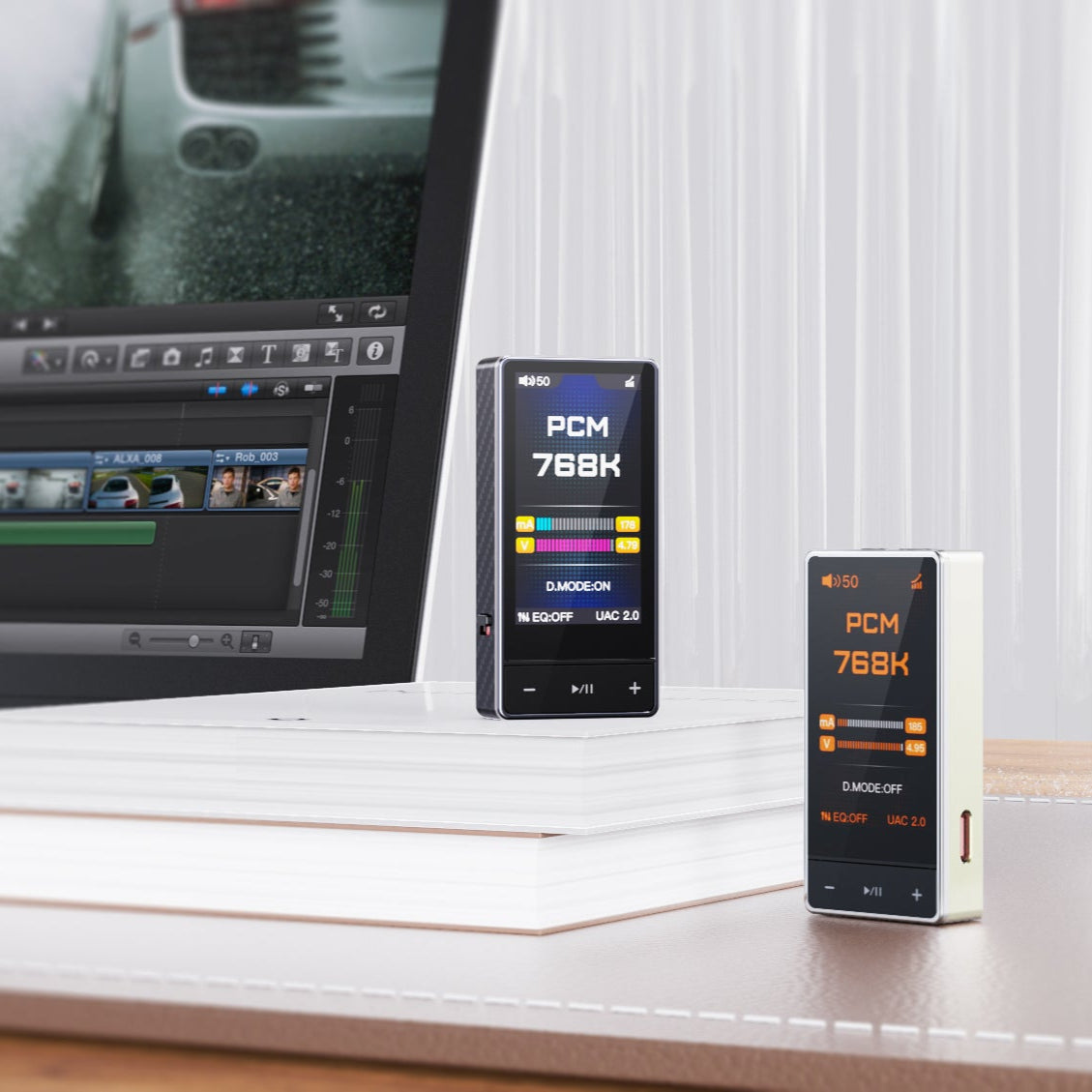 FiiO QX13 headphone amplifier and DAC with sleek black design and multiple connection ports for high-quality audio output.