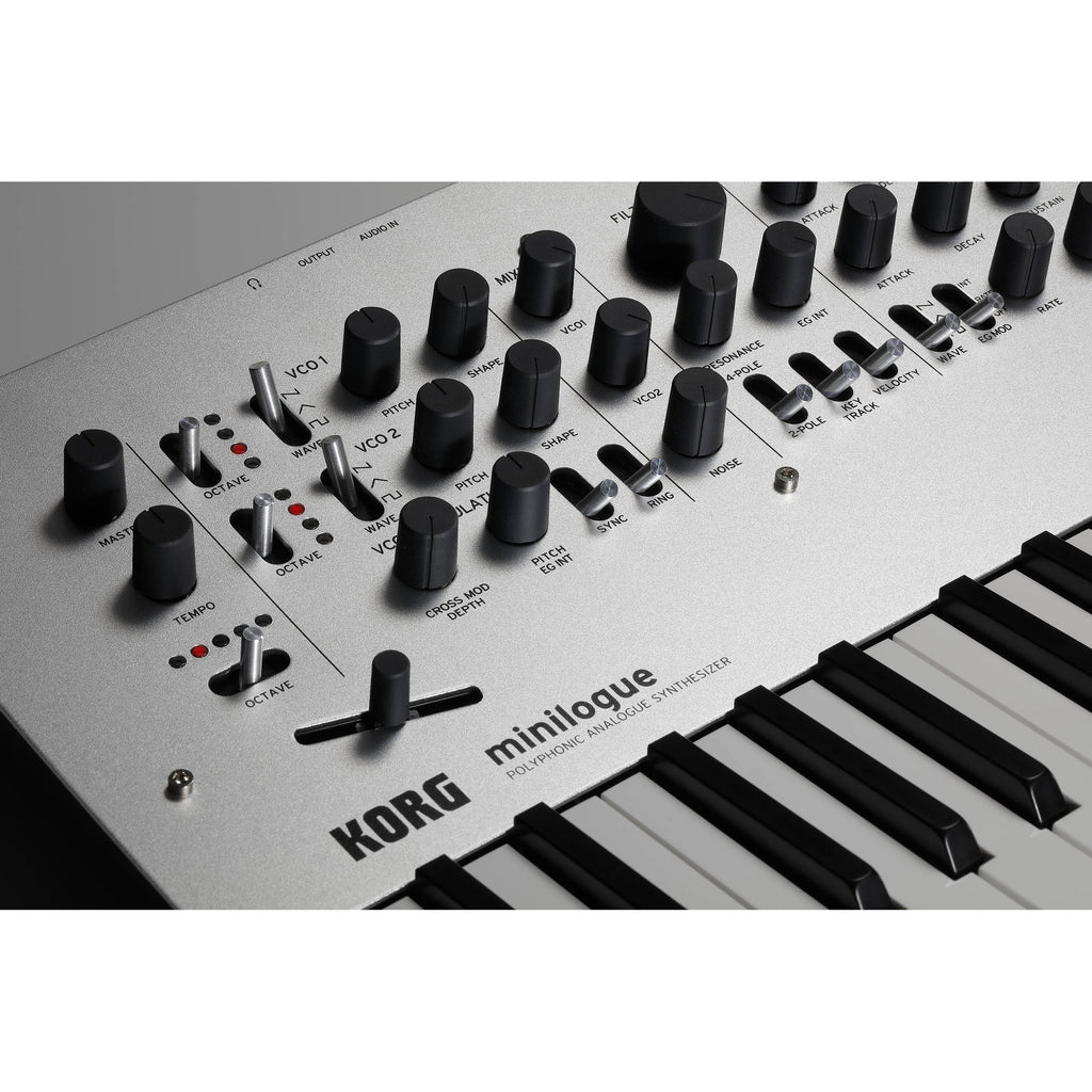 Korg Minilogue synthesizer with control knobs and keyboard, showcasing its compact design and versatile sound capabilities.