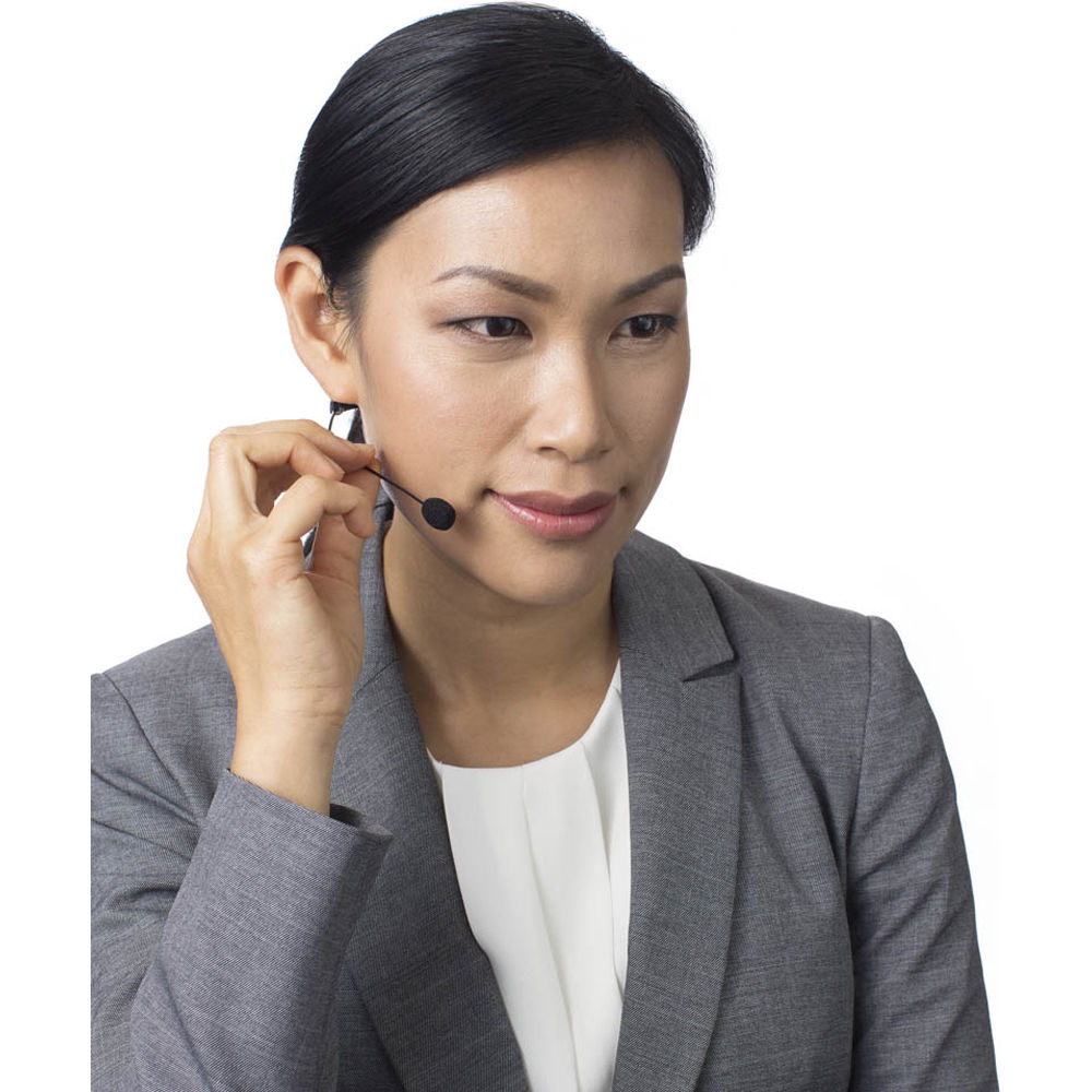 Rode HS2 lavalier microphone clipped to a person, showing its compact wearable design and microphone capsule for professional audio.