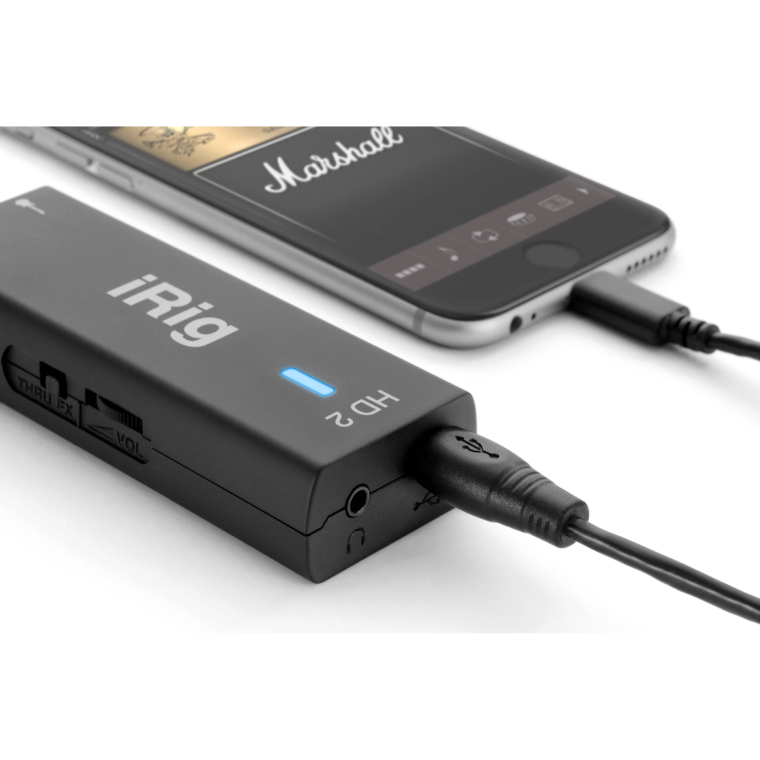 IK Multimedia iRig HD 2 guitar audio interface with USB cable and control knobs on a white background.