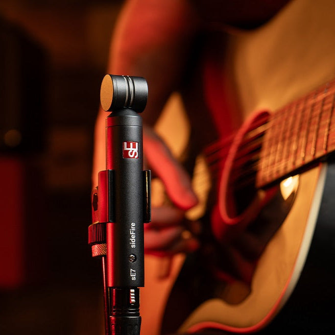 sE Electronics sE7 sideFire condenser microphone with black body and grille, mounted on a stand for professional audio recording.