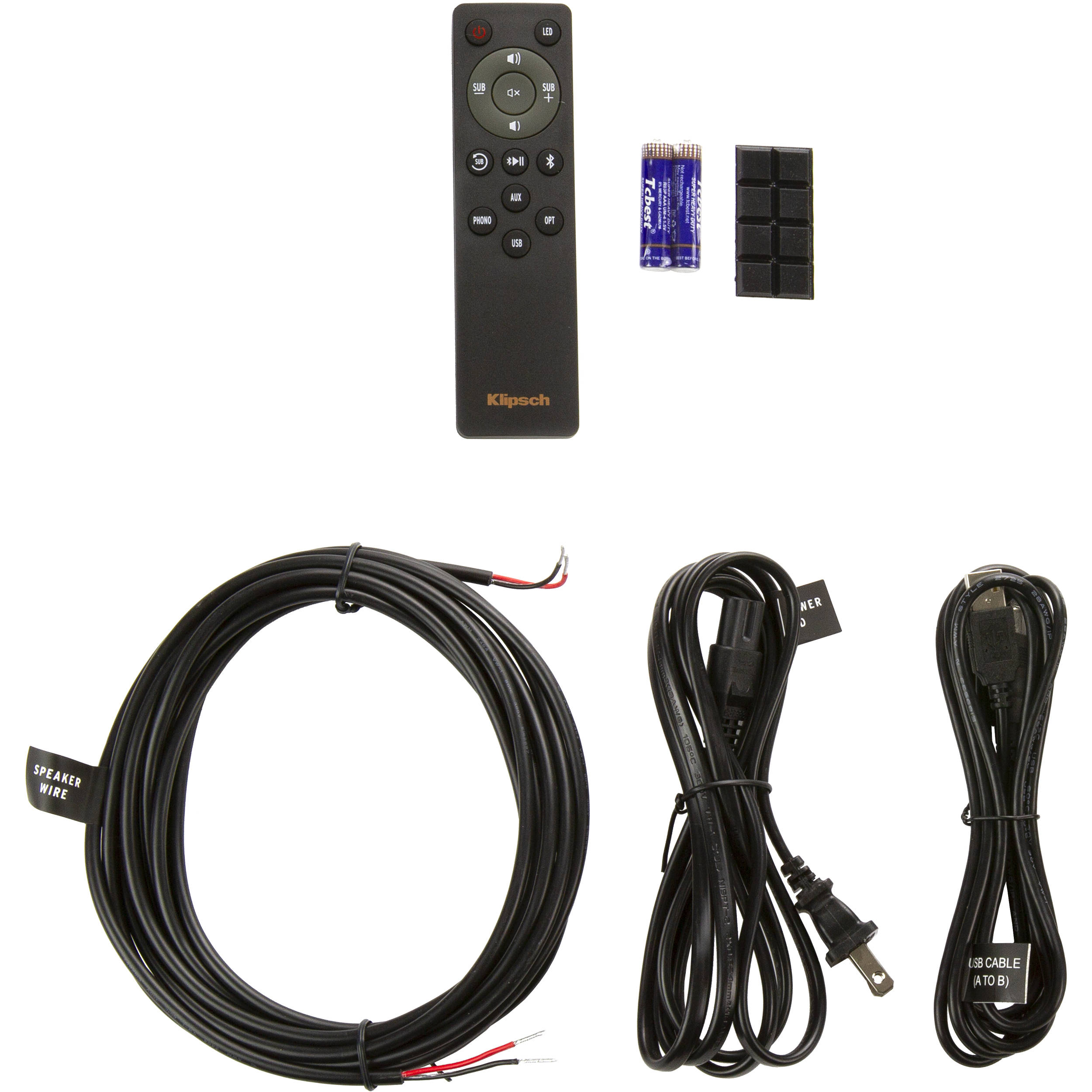 Klipsch R-41PM active bookshelf speakers with black cabinets and silver front panels, featuring built-in amplifiers and control knobs.