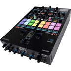 Reloop ELITE DJ mixer with dual turntables, control knobs, and audio input/output ports for professional music mixing.