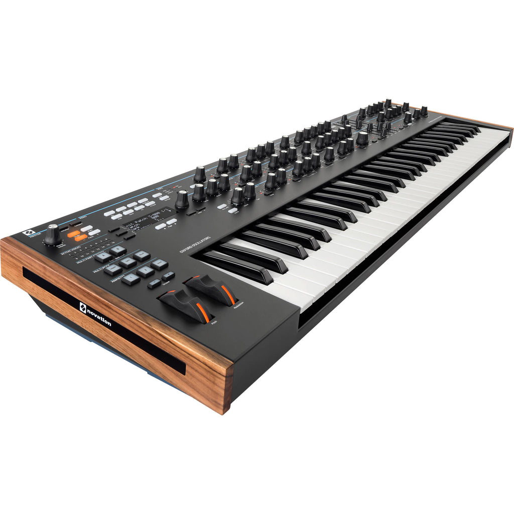 Novation Summit synthesizer with control knobs, display screen, and keys, showcasing its professional music production interface.