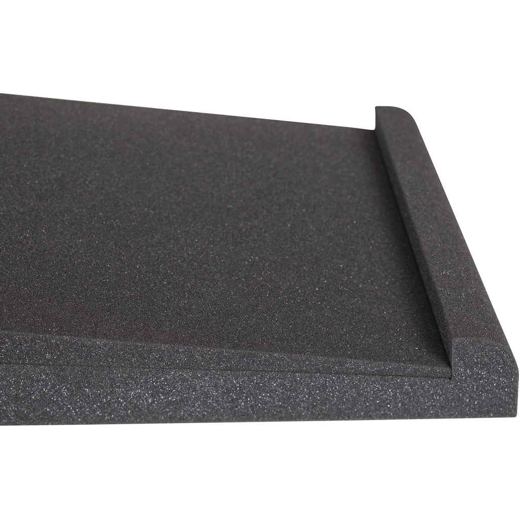 Gator Studio Monitor Isolation Pads placed under studio monitor stands for vibration reduction and sound clarity.
