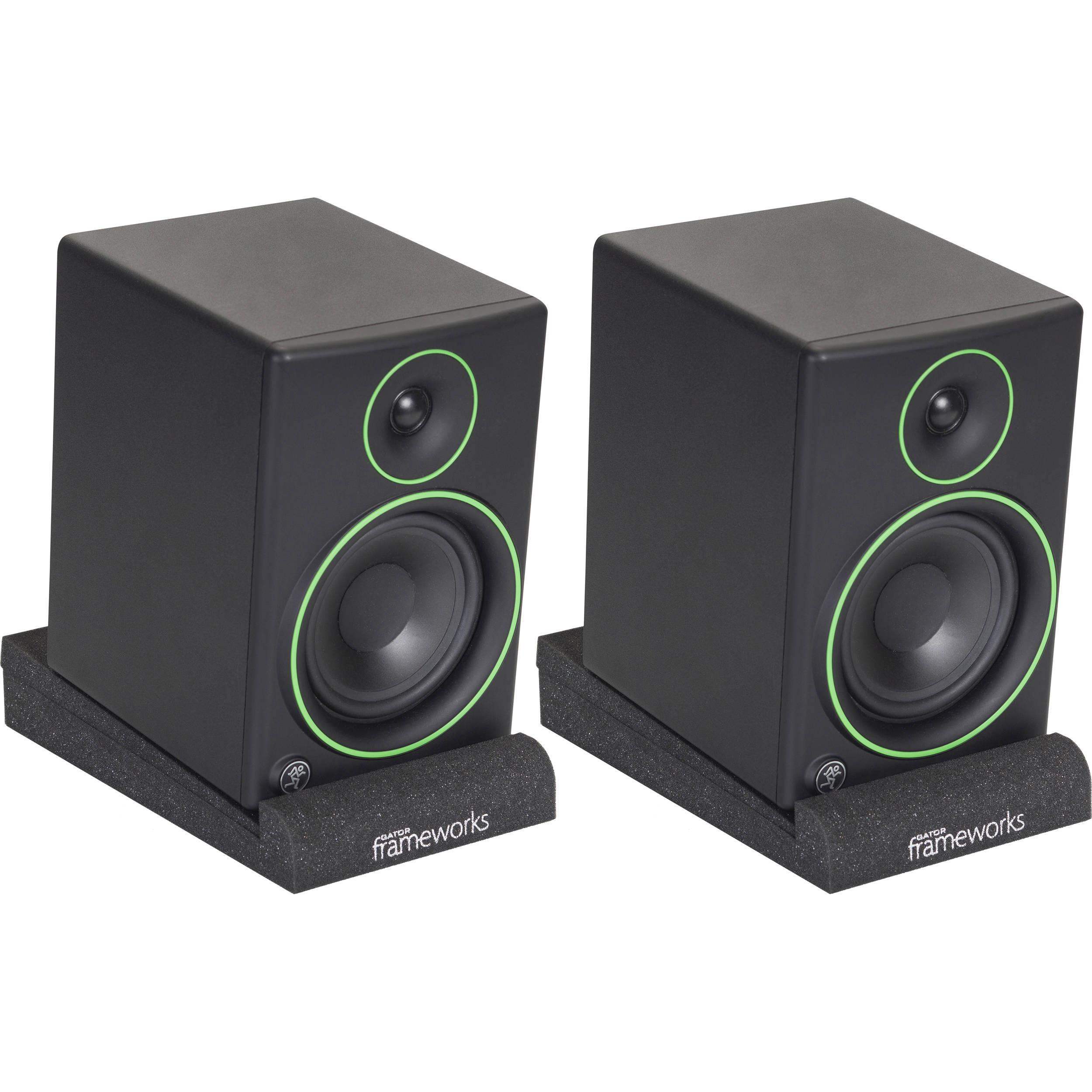 Gator Studio Monitor Isolation Pads placed on studio monitor stands, designed to reduce vibrations and improve sound quality.
