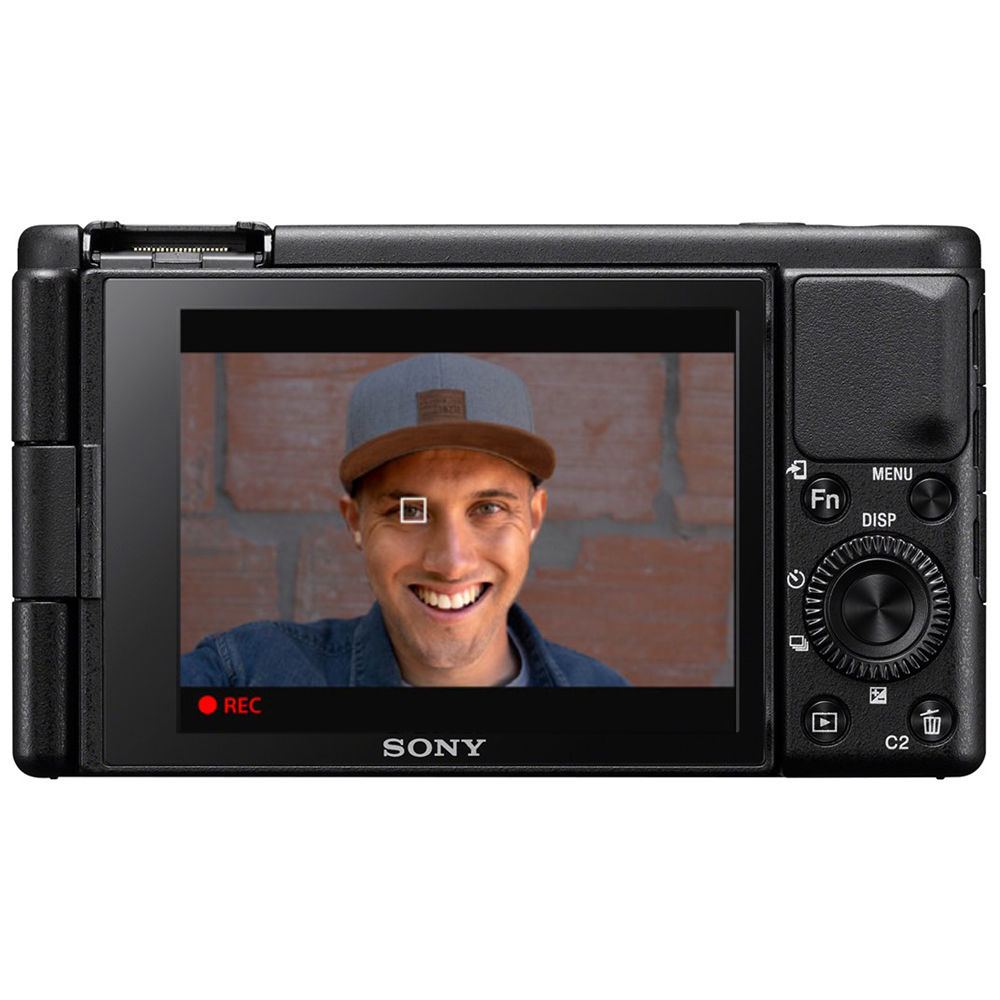 Sony ZV-1 video camera with compact design, front view showing lens and controls, ideal for vlogging and high-quality video recording.