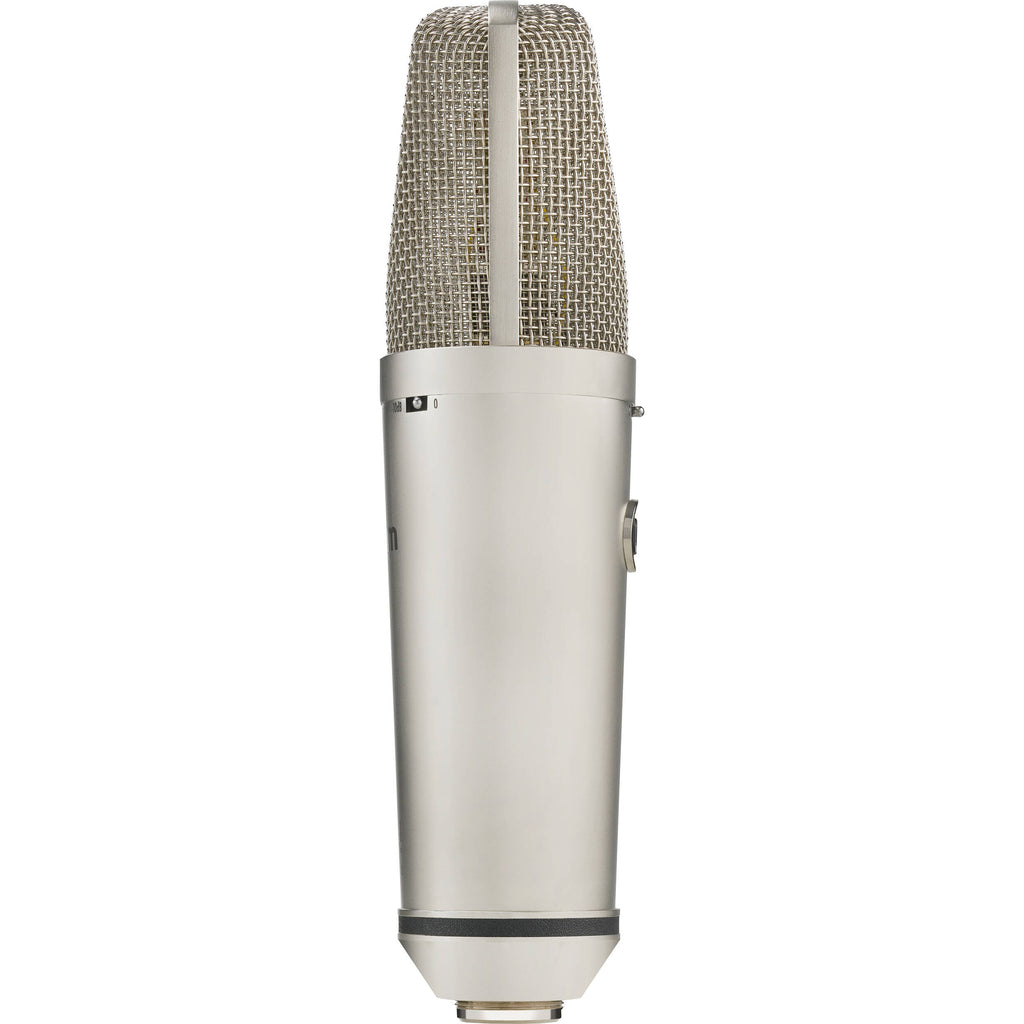 Warm Audio WA-87 R2 condenser microphone shown with metal body and grille, ideal for studio recording and vocals.