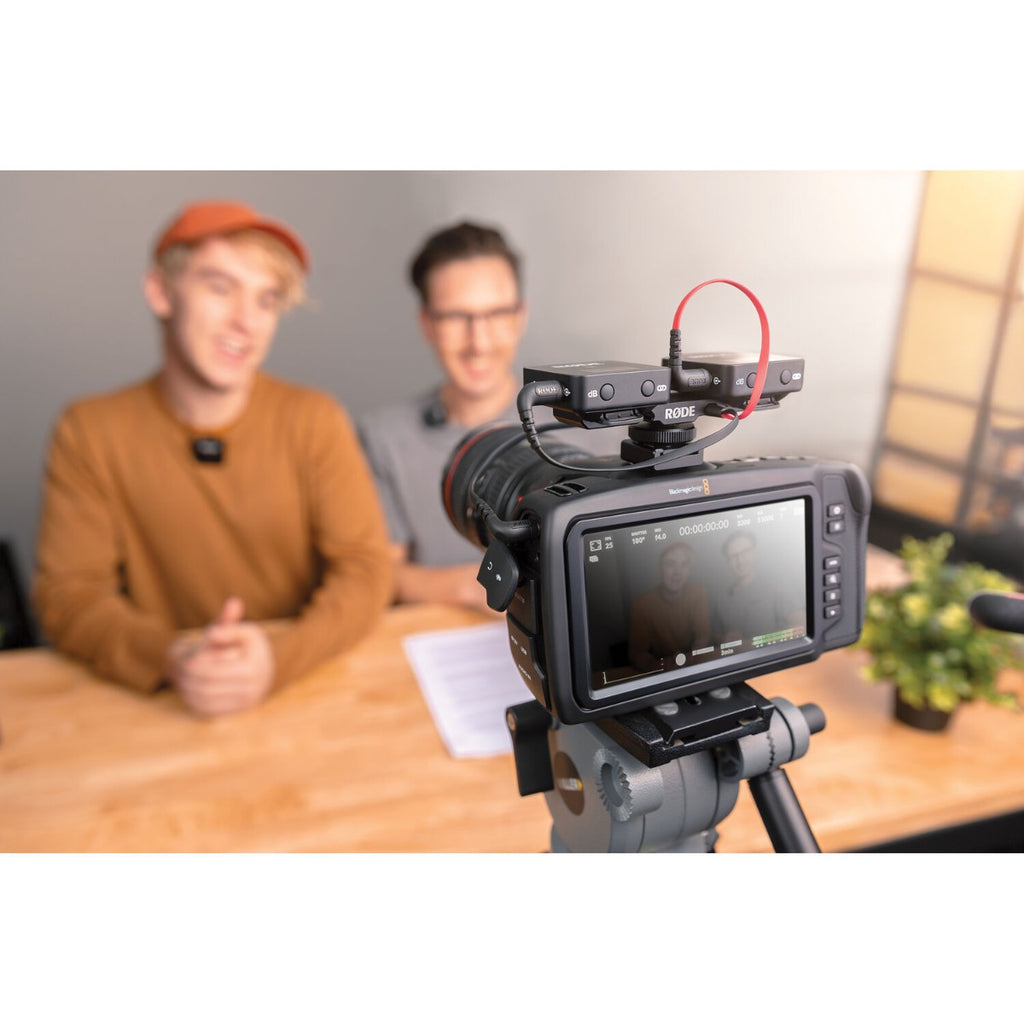 Rode DCS-1 microphone mount holder for secure attachment, black plastic with adjustable swivel for optimal positioning.