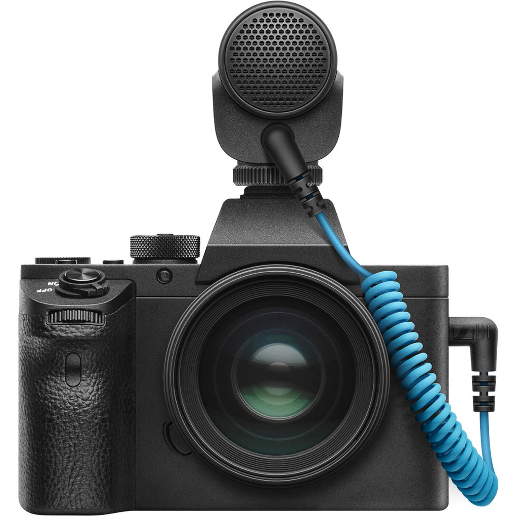 Sennheiser MKE 200 camera microphone attached to a camera, capturing audio for professional video recording.