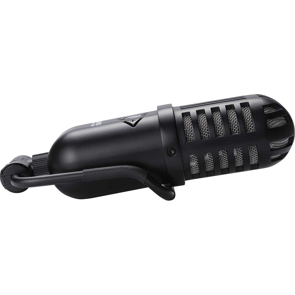 Reloop sPodcaster Go USB microphone with built-in stand and control knobs for professional podcast recording.