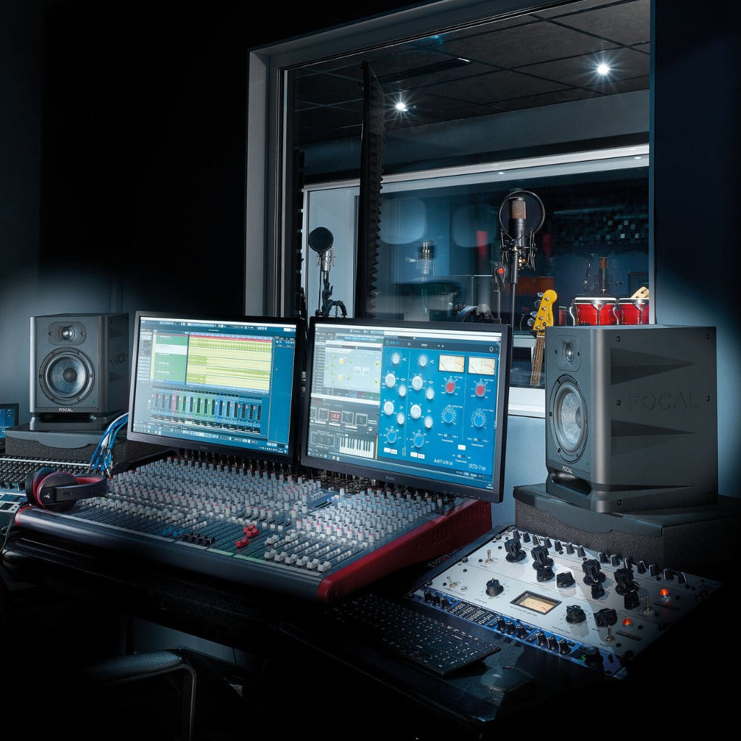 Focal Alpha 50 Evo active nearfield monitor speakers set, showing their sleek black design and front grille for studio audio monitoring.