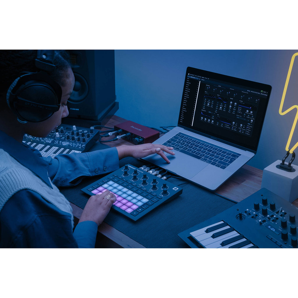 Novation Circuit Tracks sequencer with colorful controls, buttons, and knobs for music production.