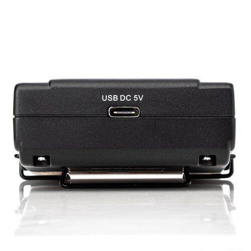 Saramonic UwMic9s Kit 2 professional wireless microphone system with transmitter and receiver units on a table.