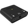 Rode AI-Micro audio interface with compact design, featuring multiple input ports and connected cables for high-quality audio recording.