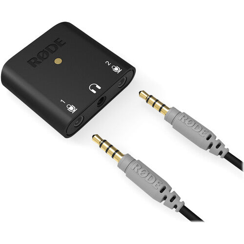Rode AI-Micro audio interface with compact design, multiple input ports, and professional audio equipment for streaming and recording.