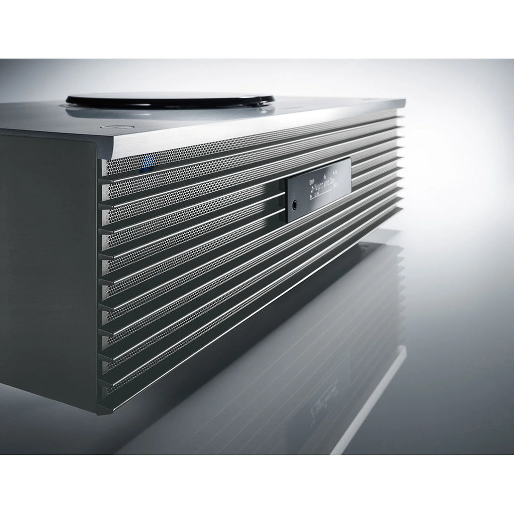 Technics SC-C70MK2 CD player with sleek black finish, digital display, and control buttons on top.