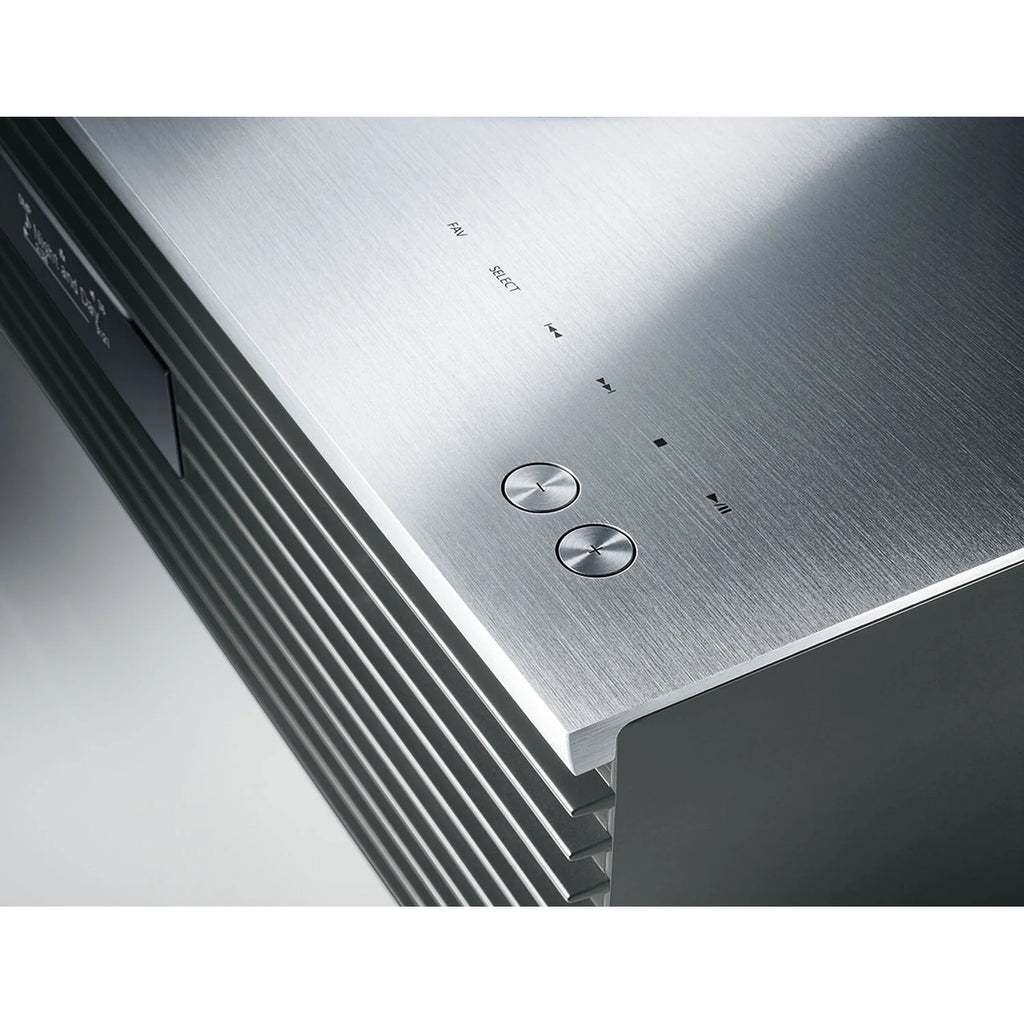 Technics SC-C70MK2 CD player with sleek design, front-loading disc slot, and control buttons on a modern audio device.
