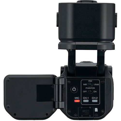 Zoom Q8n-4K video camera with dual microphones and 4K recording capabilities, shown on a desk with accessories.