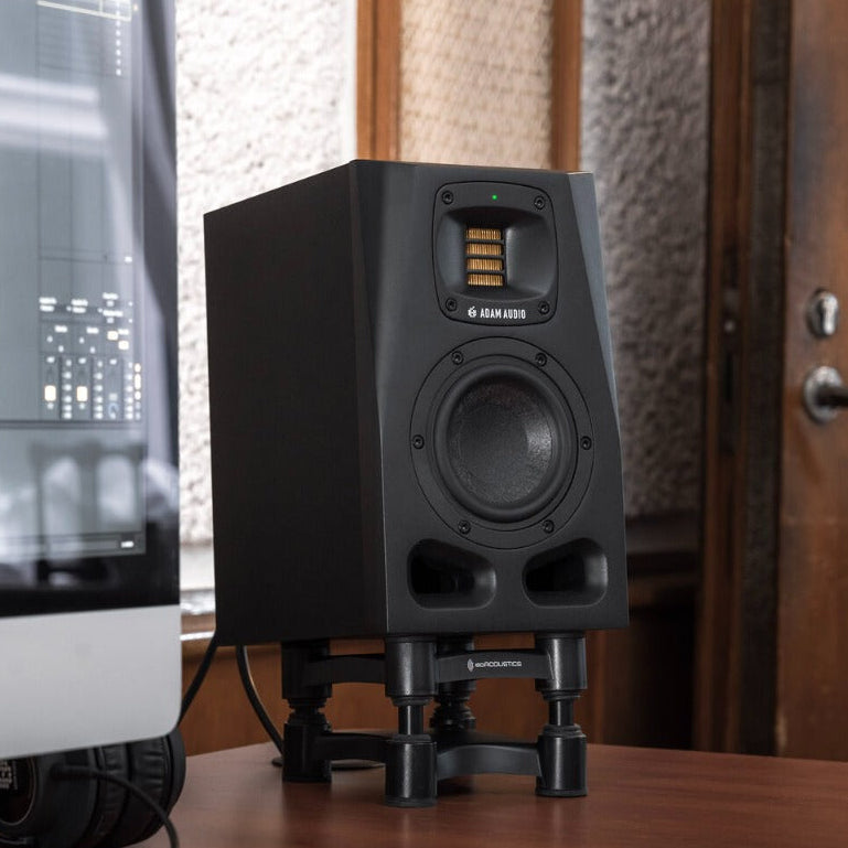 Adam Audio A4V active nearfield monitors shown with detailed speaker cones and sleek black finish for studio audio production.