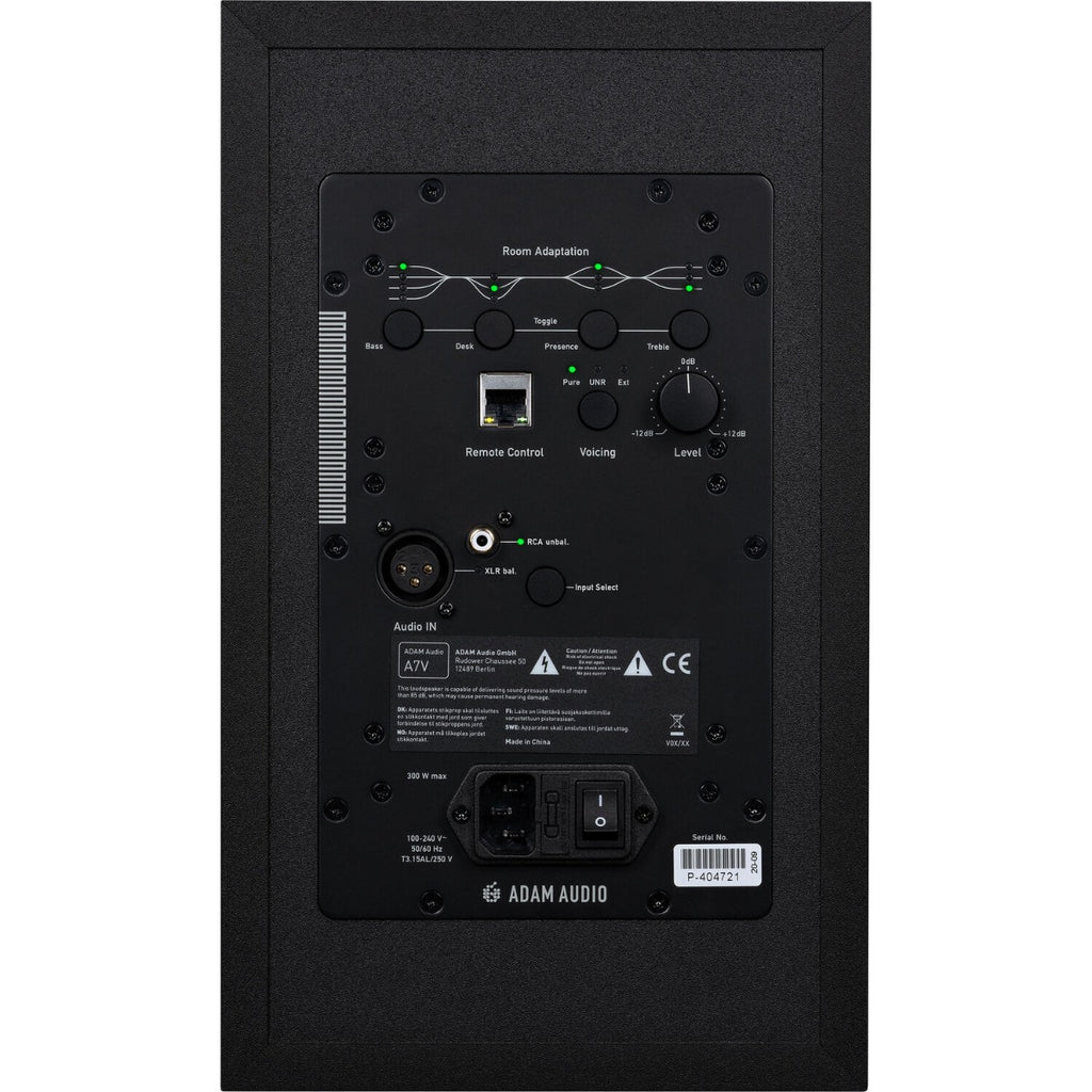 Adam Audio A7V active nearfield monitor speaker showing front view with control knobs and woofer in black and yellow design.