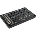 Moog Mavis synthesizer with knobs and keyboard, compact electronic musical instrument for studio and live performance.