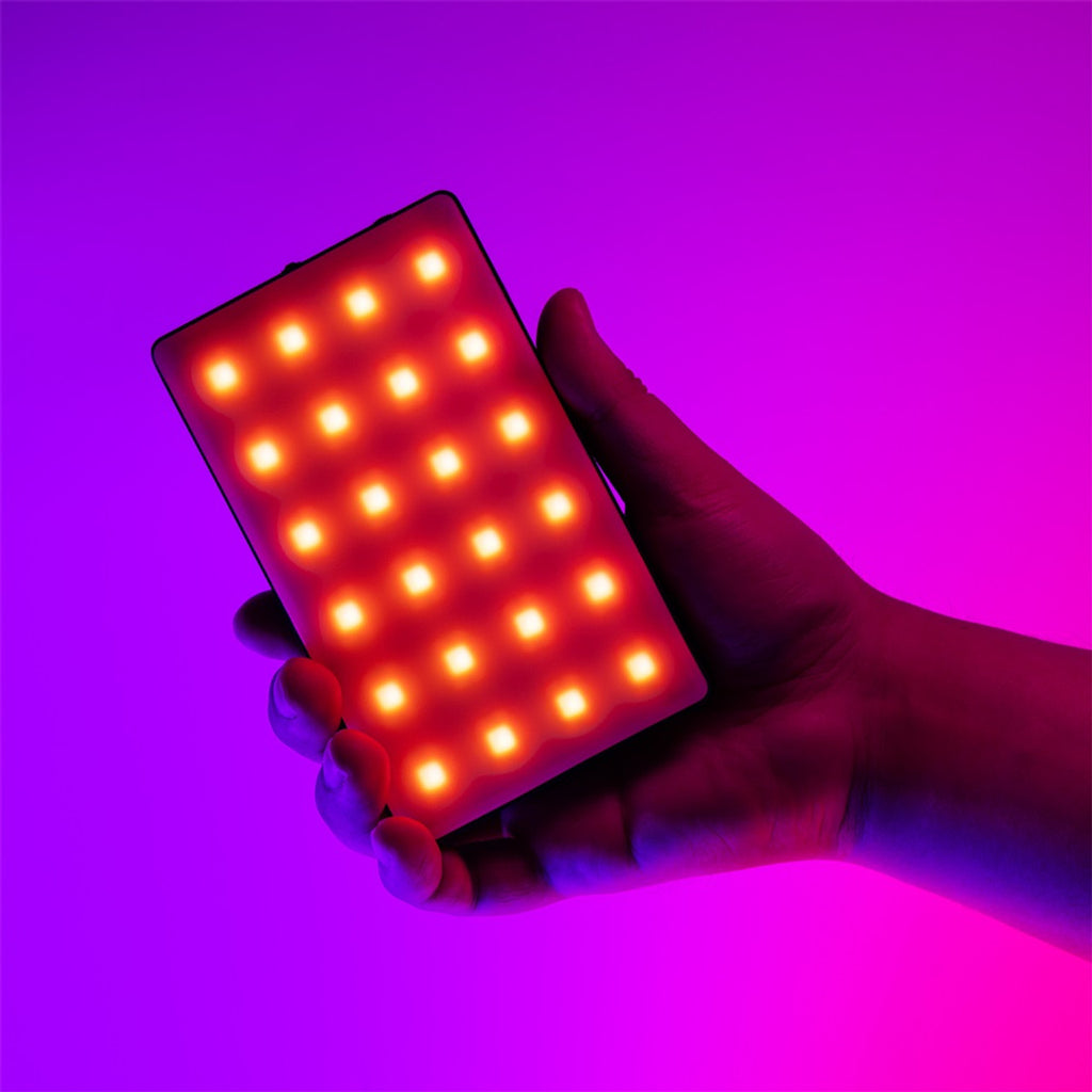 SmallRig RM120 RGB video light showing adjustable color options and compact design for professional photography and video lighting.