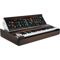 Moog Minimoog Model D synthesizer with vintage-style control panel and keyboard, showcasing classic analog music equipment.