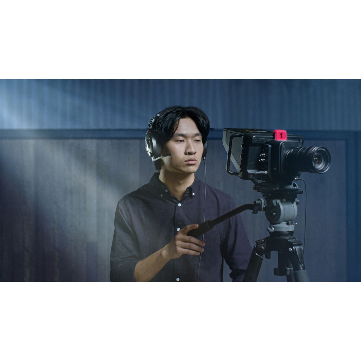 Rode NTH-100M gaming headphones with over-ear design and adjustable headband, featuring built-in microphone and plush ear cushions.