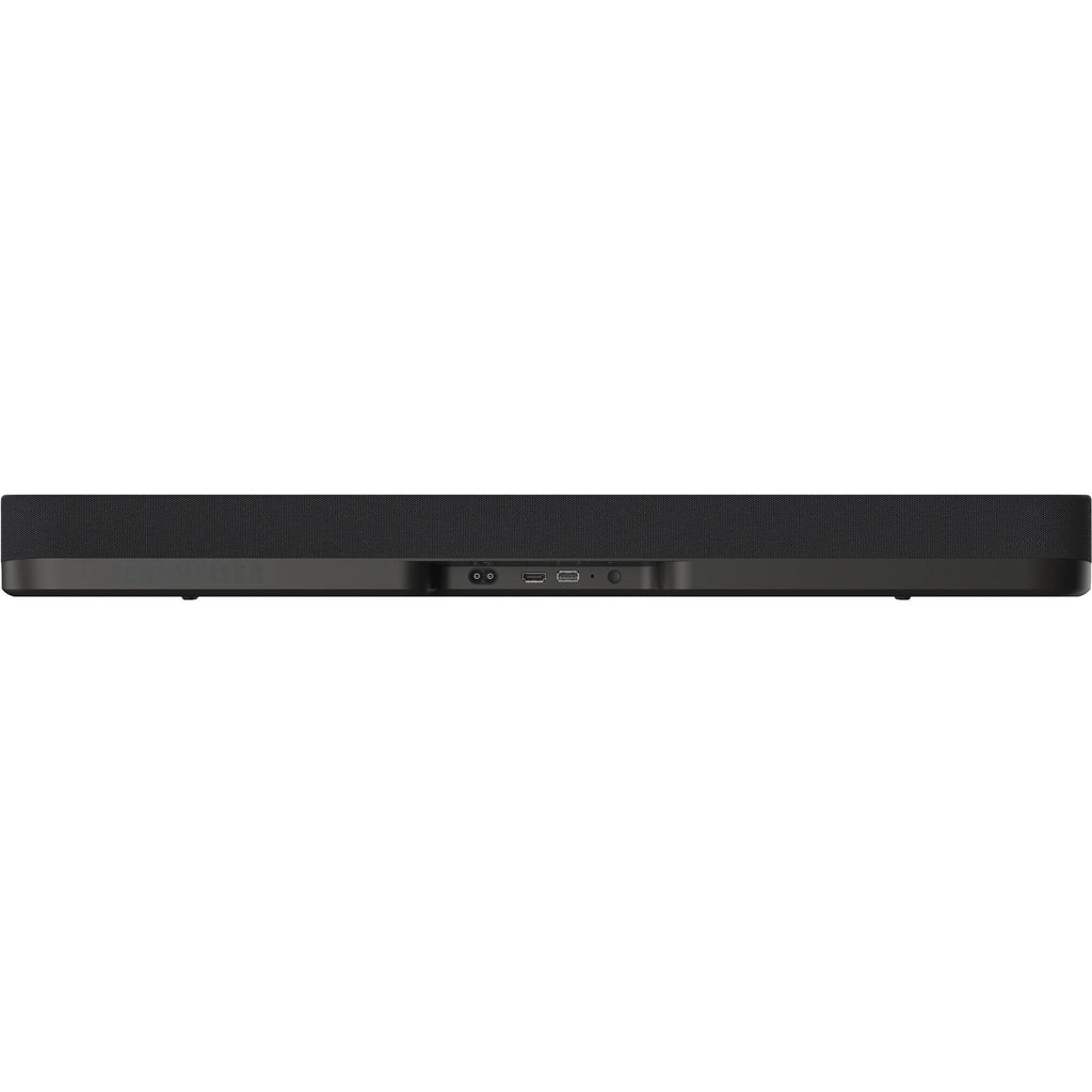 Sennheiser Ambeo Soundbar Mini mounted on a TV stand with a sleek black design and compact size for immersive audio.
