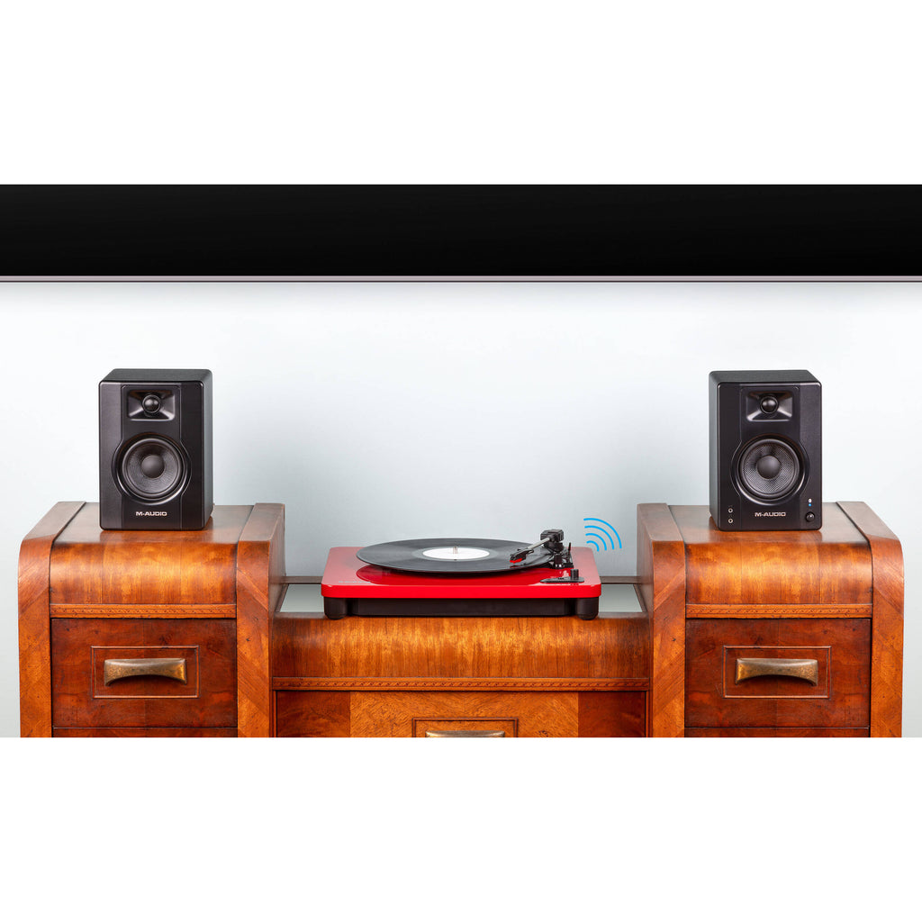 M-Audio BX3 BT desktop speakers with black finish, compact design, and control knobs on the front for high-quality audio playback.