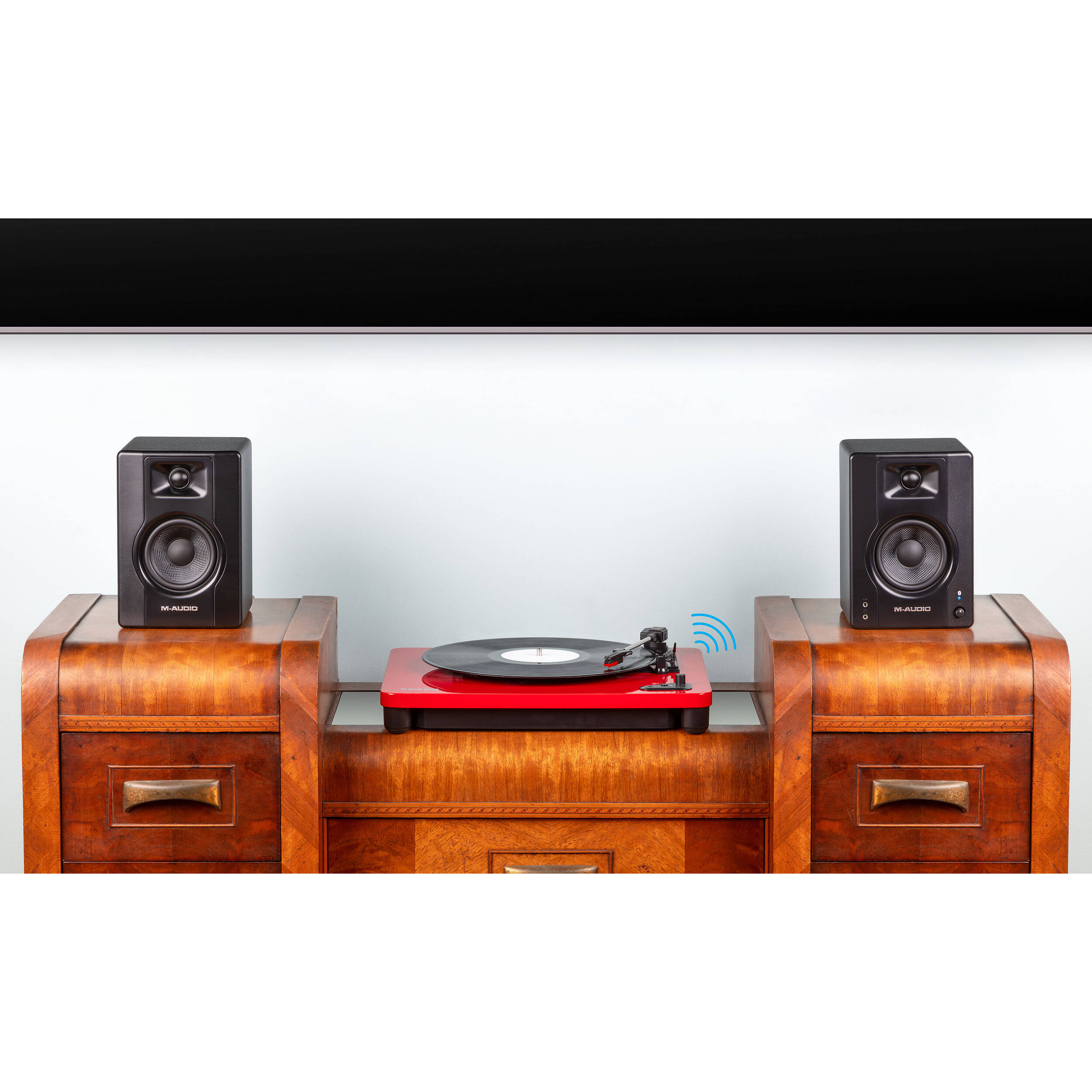 M-Audio BX3 BT desktop speakers with black finish, compact design, and control knobs on the front for high-quality audio playback.