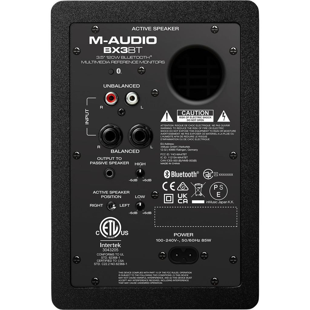 M-Audio BX3 BT desktop speakers showing black speaker cabinets with control knobs and Bluetooth connectivity.