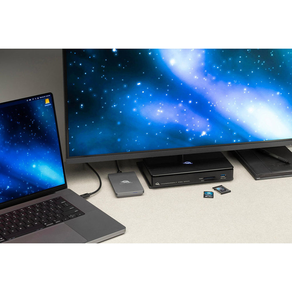 OWC Thunderbolt Pro Dock with multiple ports including USB, Thunderbolt, and audio jacks on a sleek black station.