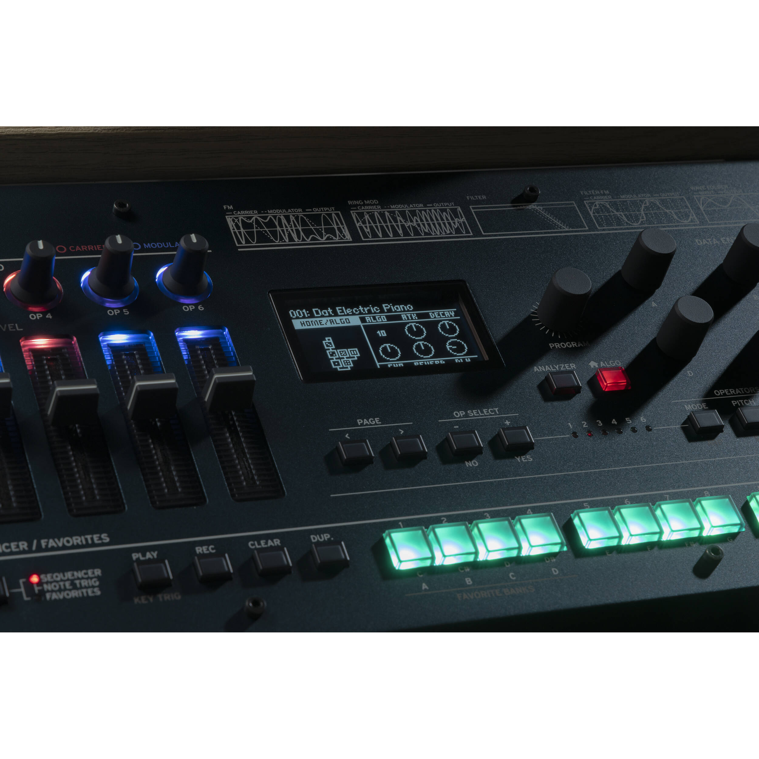 Korg Opsix synthesizer module with colorful control knobs and display, compact electronic music instrument for sound shaping.