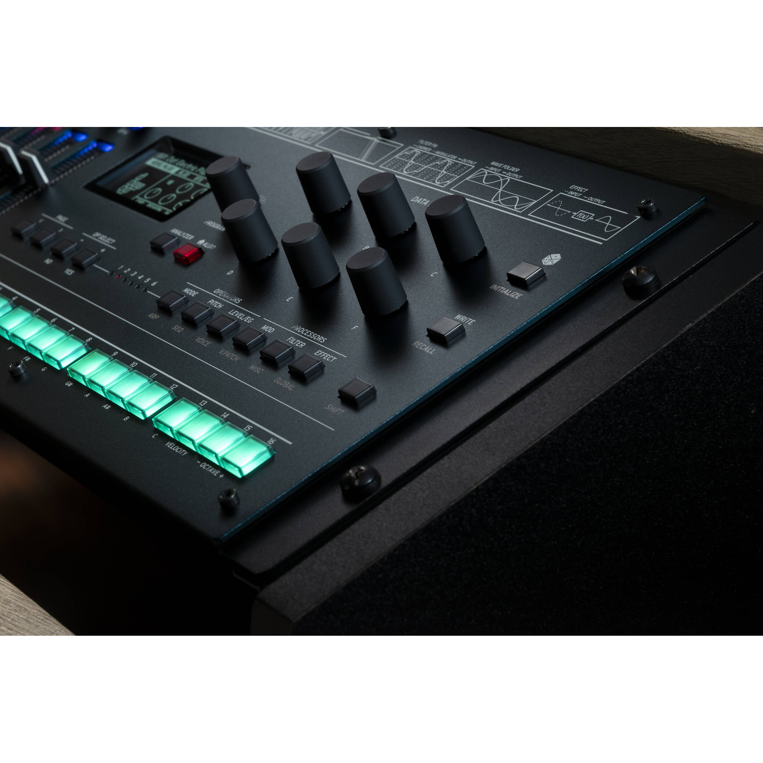 Korg Opsix synthesizer module with colorful control knobs and input/output ports, designed for electronic music production.