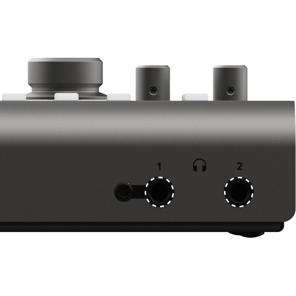 Audient iD44 MK2 audio interface with multiple input/output ports and sleek black design, used on a desk setup.