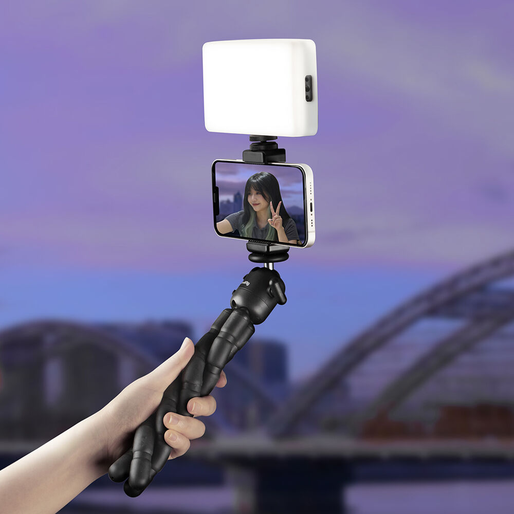 SmallRig RM120 RGB video light showing adjustable color and brightness settings on a compact, portable lighting device.